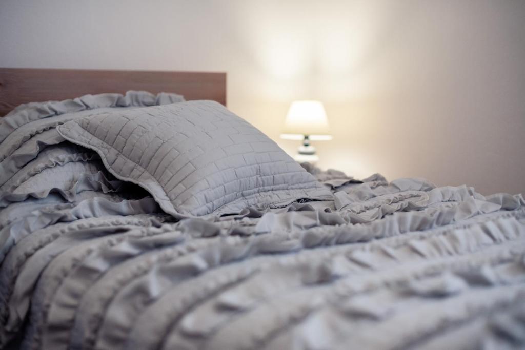 Postel nebo postele na pokoji v ubytování Apartman Galov