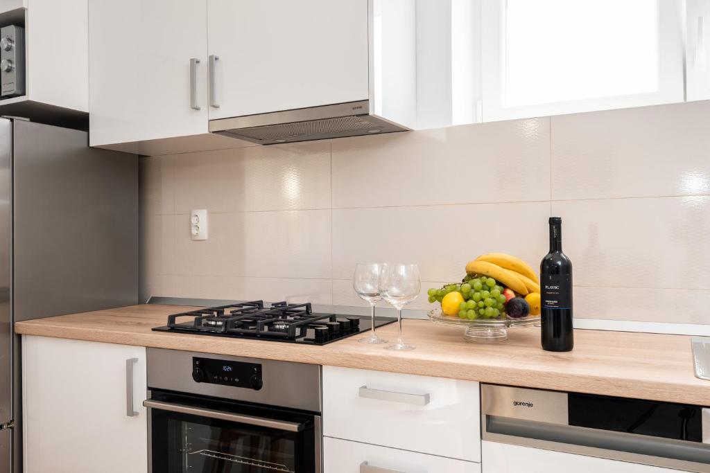 Kuchyň nebo kuchyňský kout v ubytování Apartman Galov