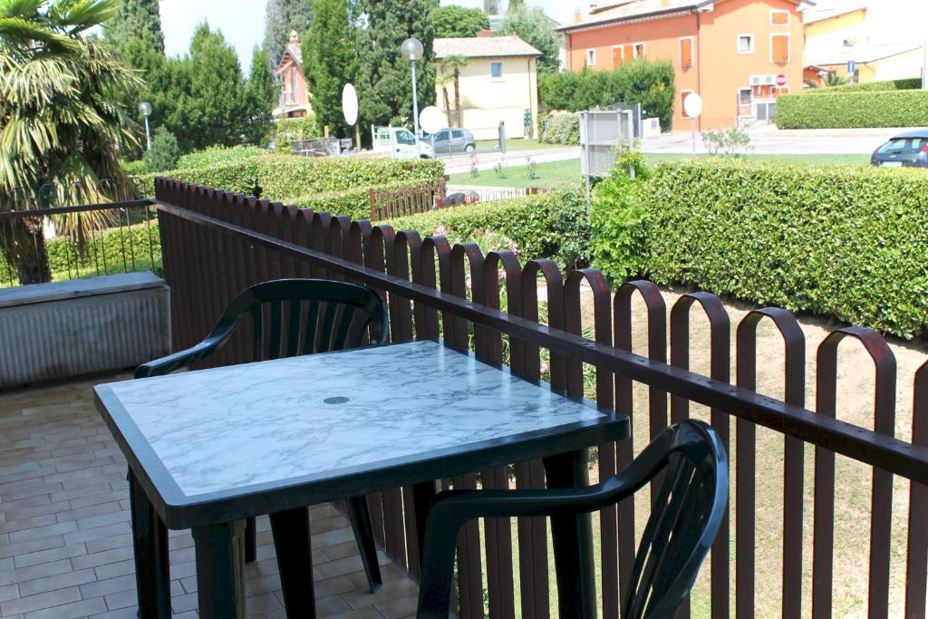 A garden outside Apartments in Lazise/Gardasee 21939