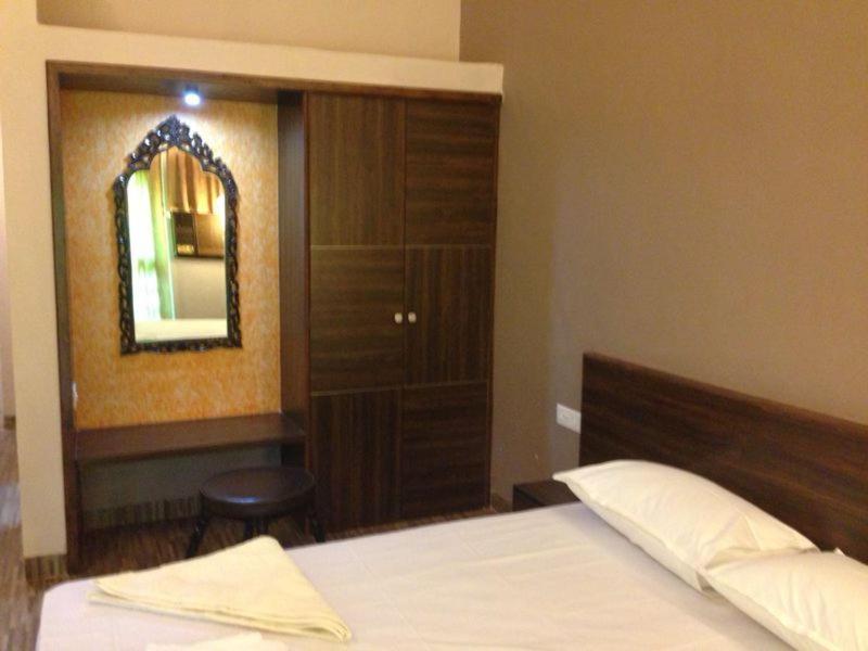 Postel nebo postele na pokoji v ubytování Hotel Bonanza