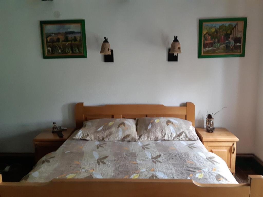 Postel nebo postele na pokoji v ubytování Ilkićev kućerak Apartman