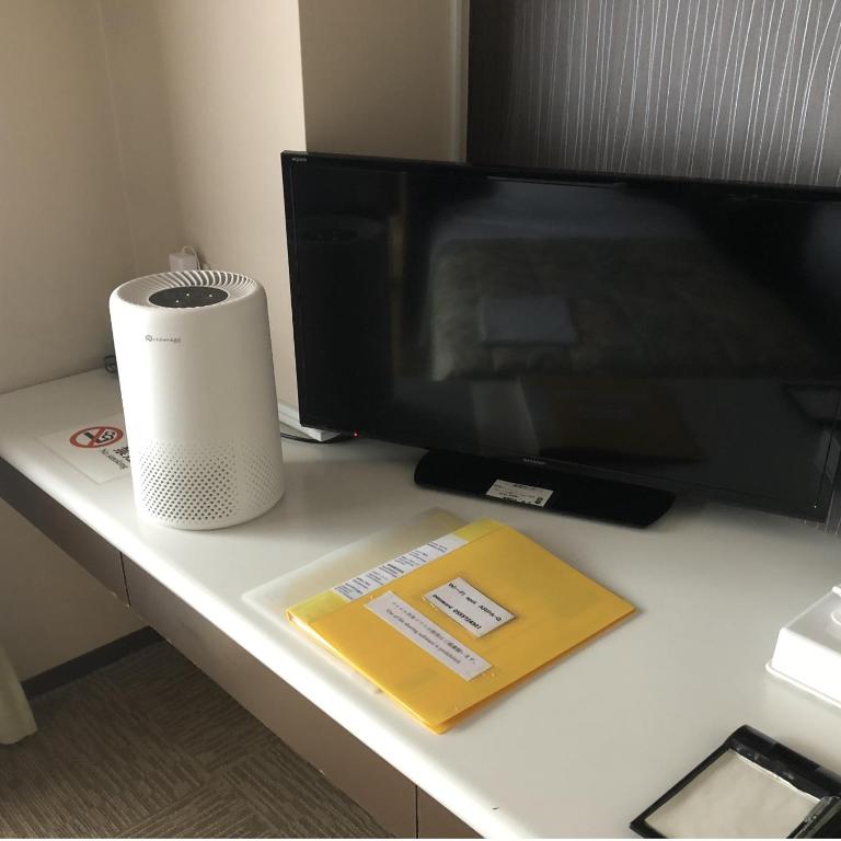 TV a/nebo společenská místnost v ubytování Sawa Hotel