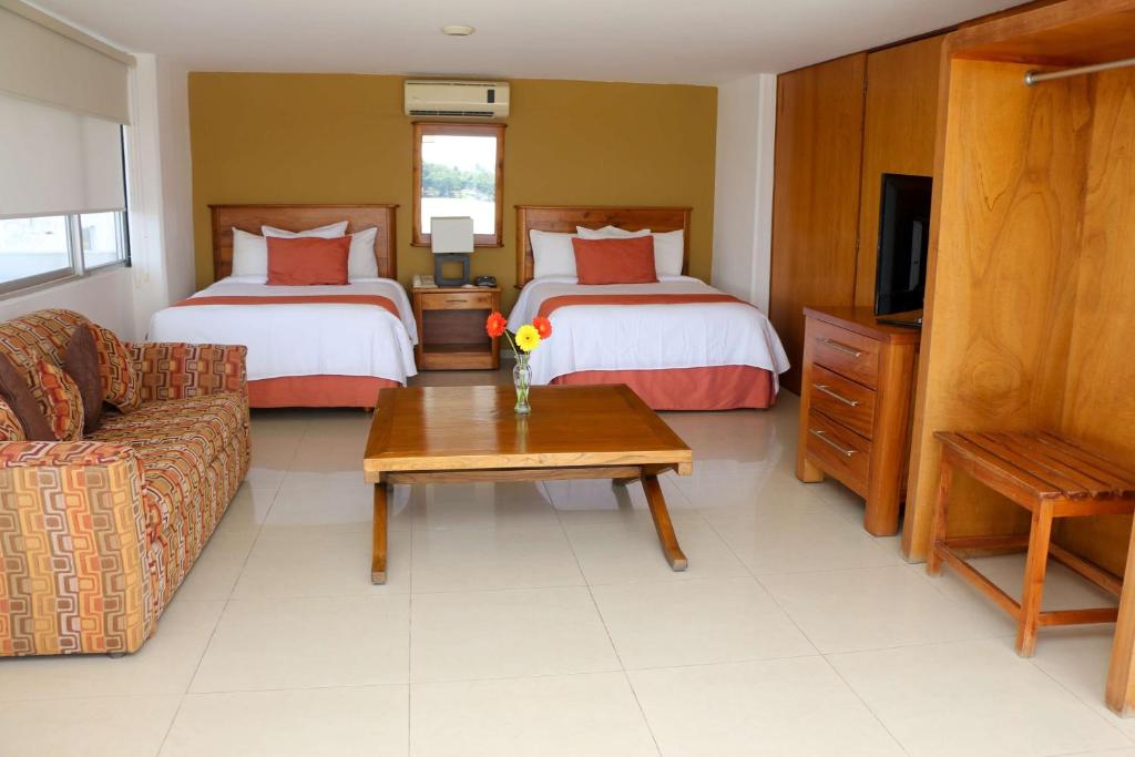 Postel nebo postele na pokoji v ubytování Best Western Riviera Tuxpan
