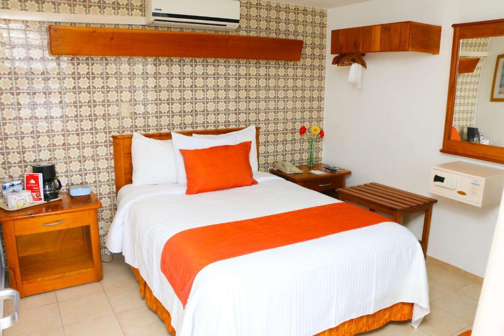 Postel nebo postele na pokoji v ubytování Best Western Riviera Tuxpan