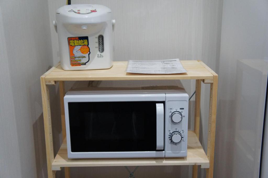 Kuchyň nebo kuchyňský kout v ubytování Amenity Hotel Kyoto