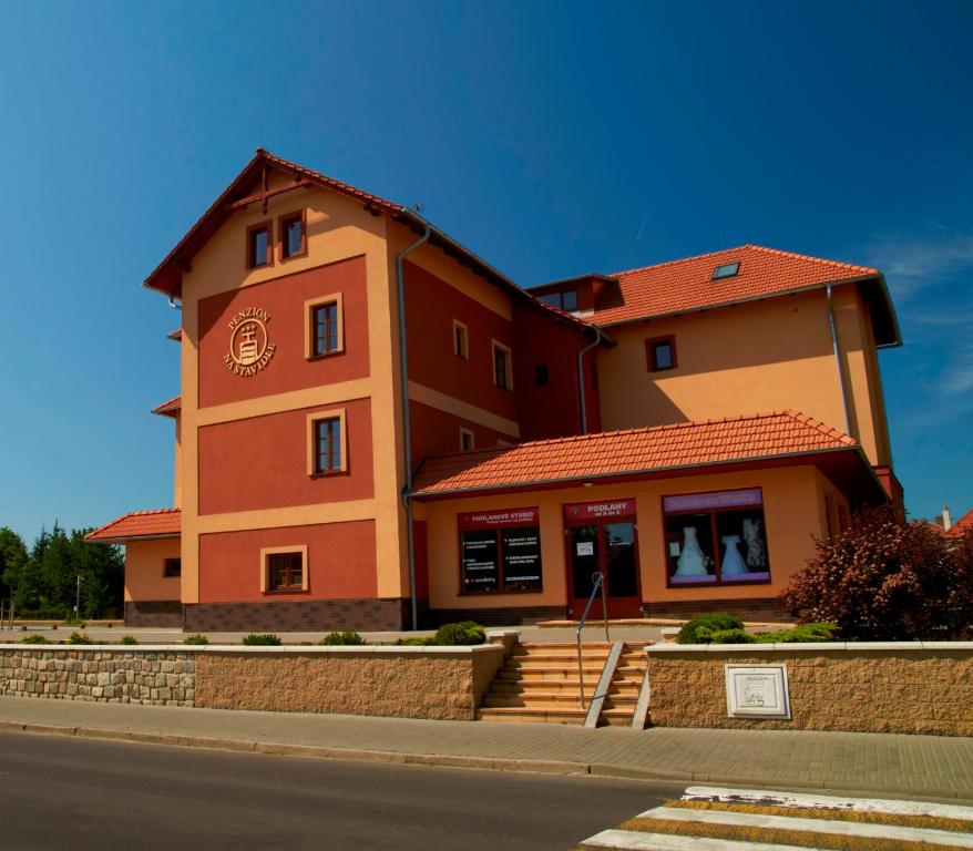 a building on the side of a road at Penzion Na Stavidle in Uherské Hradiště