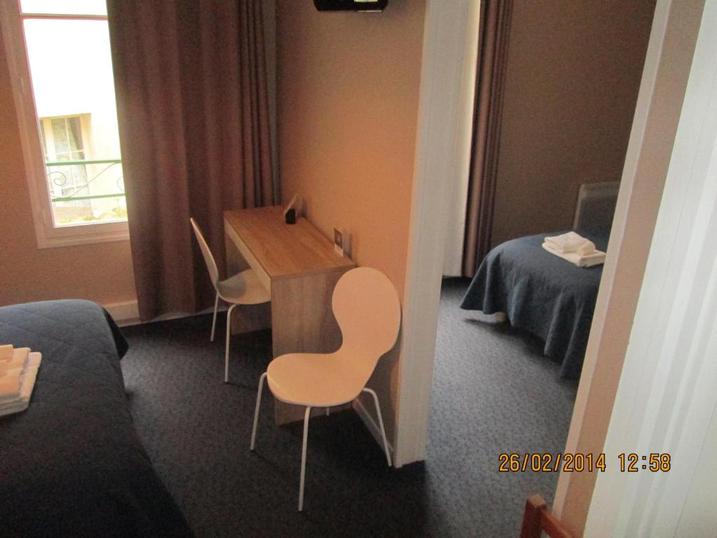 Postel nebo postele na pokoji v ubytování Hôtel-Restaurant Le Blueberry