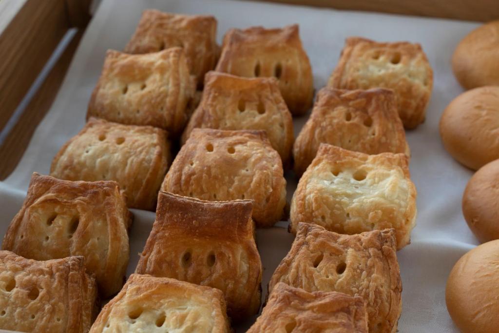 a group of pastries sitting on top of a tray at Washington R&B Hotel Nagoya Shinkansenguchi in Nagoya