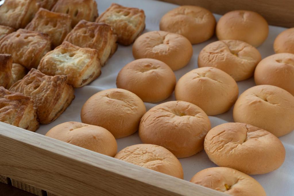 a box filled with buns and other pastries at Washington R&B Hotel Nagoya Shinkansenguchi in Nagoya