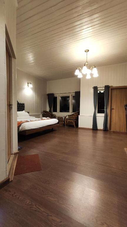 Postel nebo postele na pokoji v ubytování Arcadia Heritage Resort