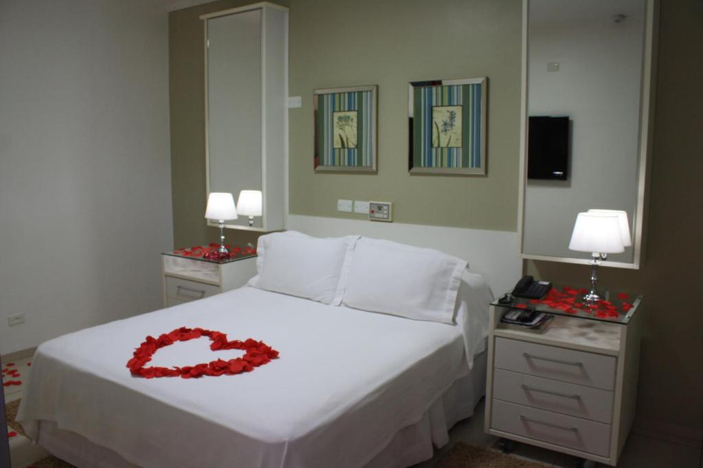 Postel nebo postele na pokoji v ubytování Hotel Pousada Ourinhos
