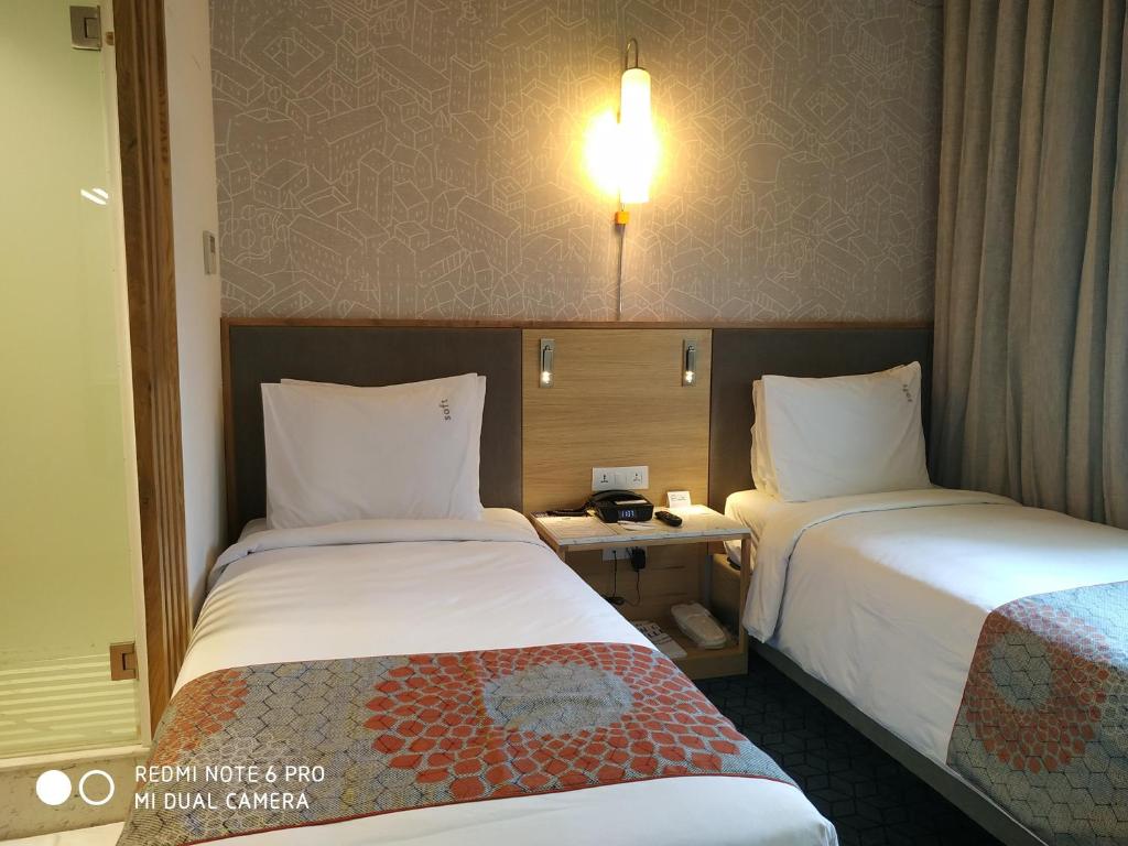 Posteľ alebo postele v izbe v ubytovaní Holiday Inn Express Hyderabad Banjara Hills, an IHG Hotel