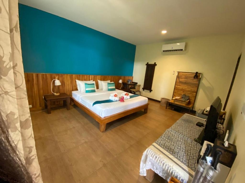 Postel nebo postele na pokoji v ubytování Good Times Resort Kanchanaburi
