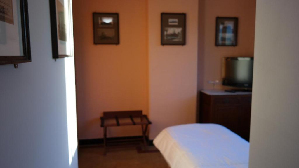 Postel nebo postele na pokoji v ubytování De Bonte Os Hotel & Tower