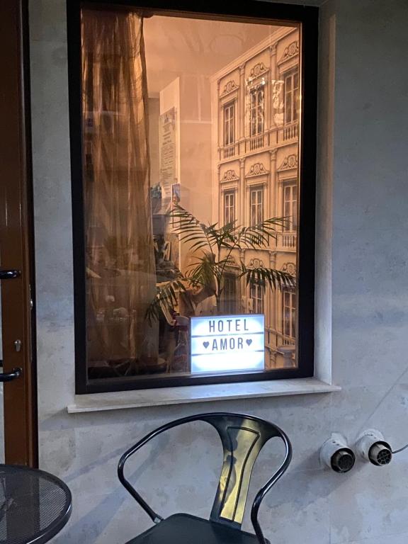 TV a/nebo společenská místnost v ubytování Family Hotel Amor