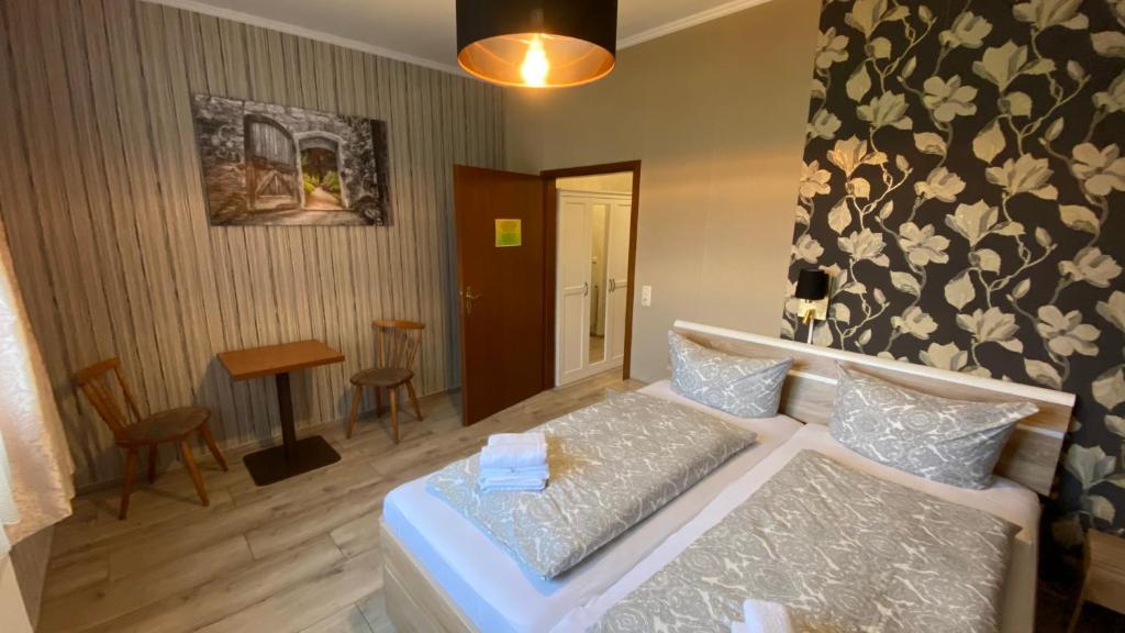 Postel nebo postele na pokoji v ubytování Schröder's Motel