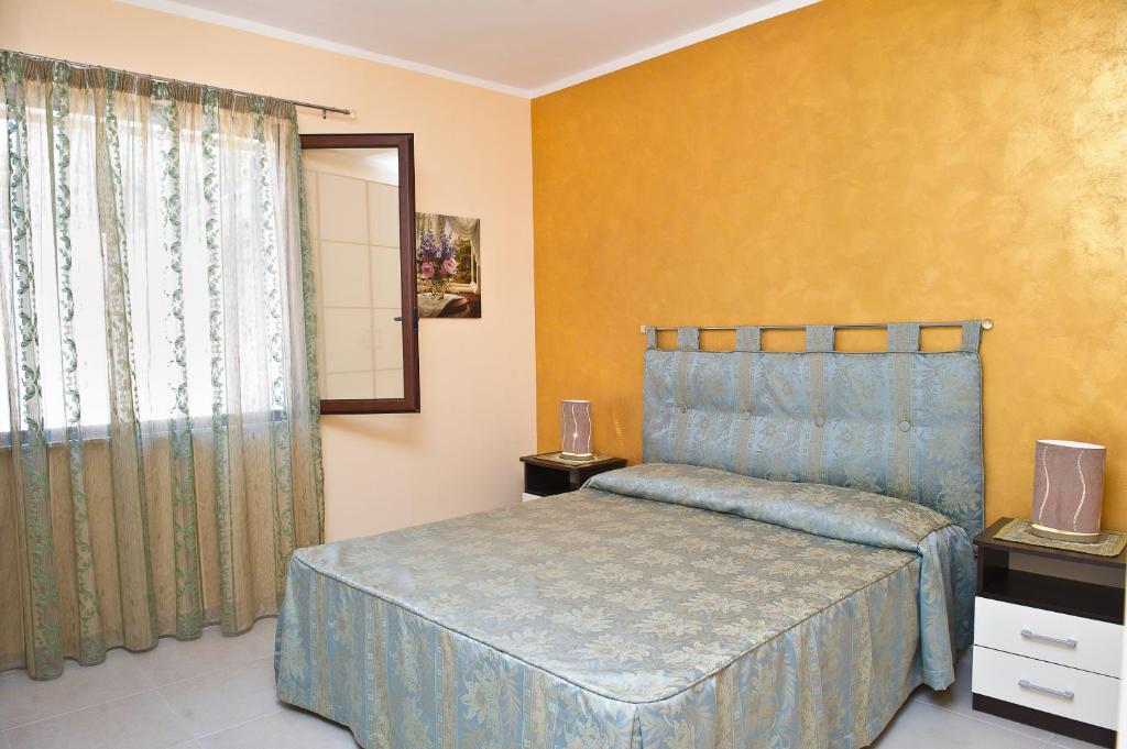 Postel nebo postele na pokoji v ubytování Bono Vacanze Villa San Marco Luxury Holidays Homes