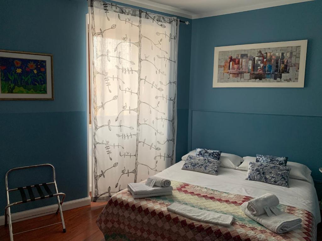 Posteľ alebo postele v izbe v ubytovaní B&B Casanova