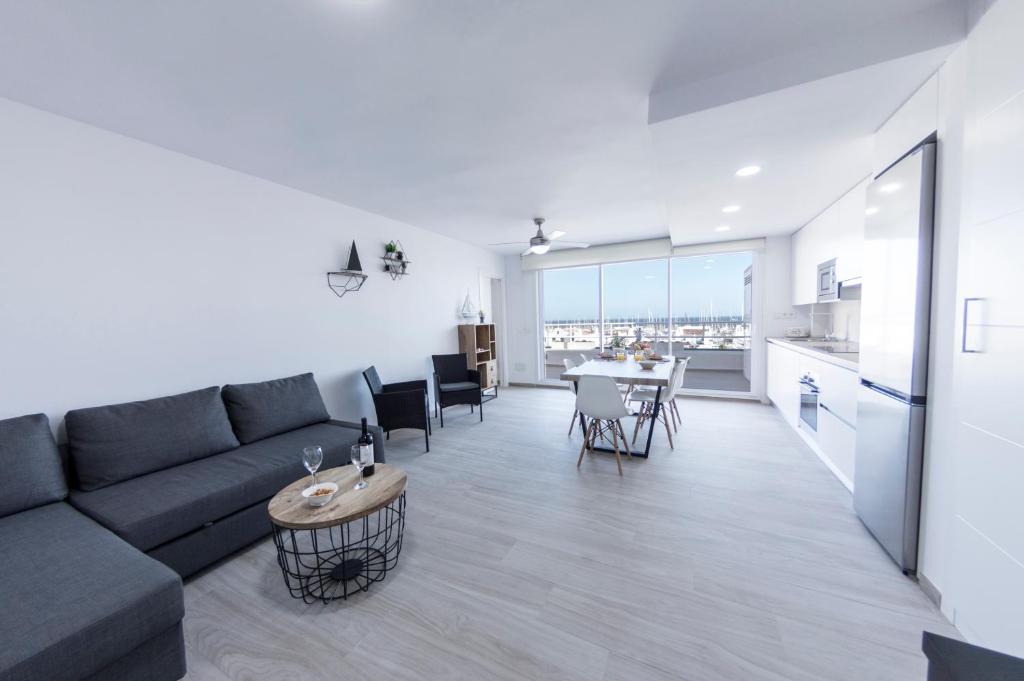 a living room with a couch and a table at Seaport Aguadulce Beach in Aguadulce