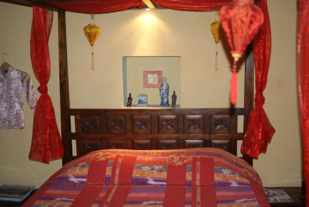 Postel nebo postele na pokoji v ubytování Demeure de Digoine "Chambre d'Hotes"