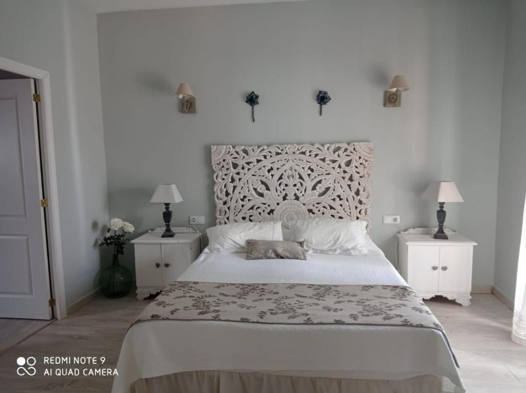 Cama o camas de una habitación en Finca La Favorita- Suites