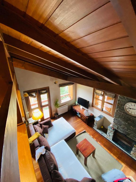 A bed or beds in a room at Panoramic Xalet la Molina con Vistas Excelentes