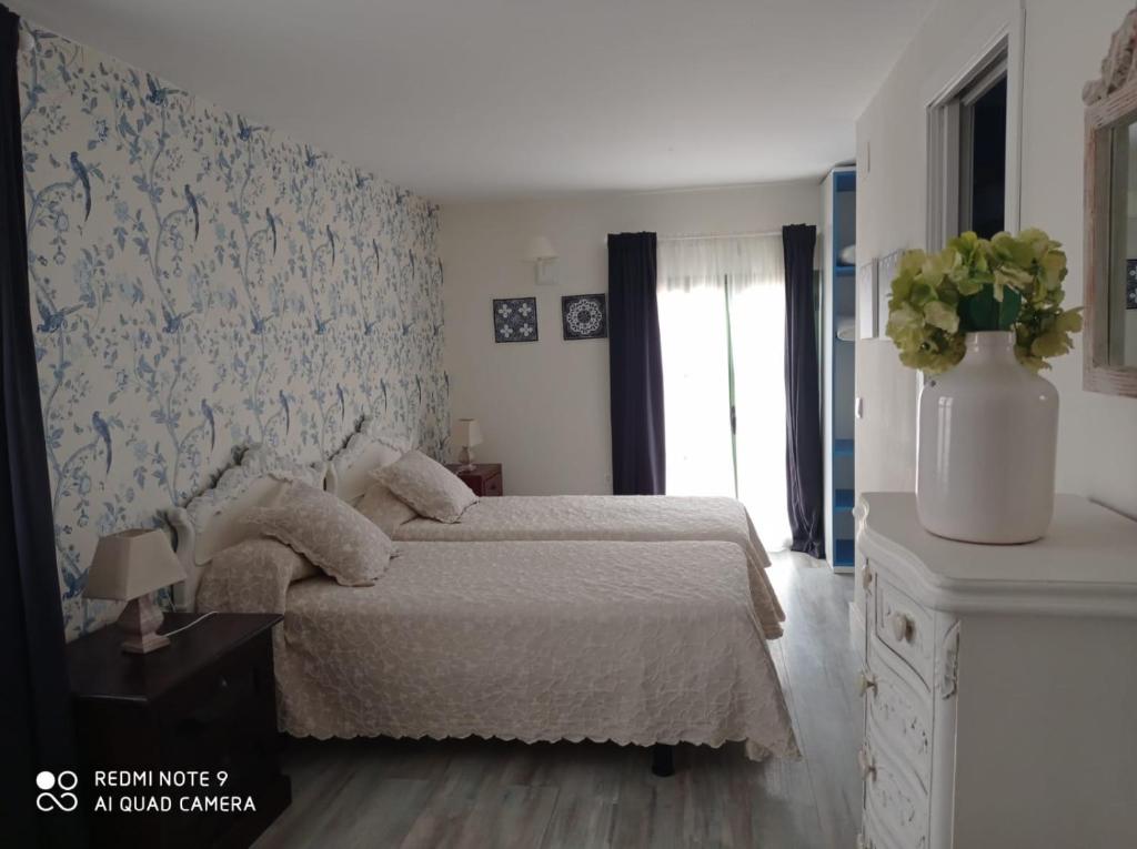 Cama o camas de una habitación en Finca La Favorita- Suites