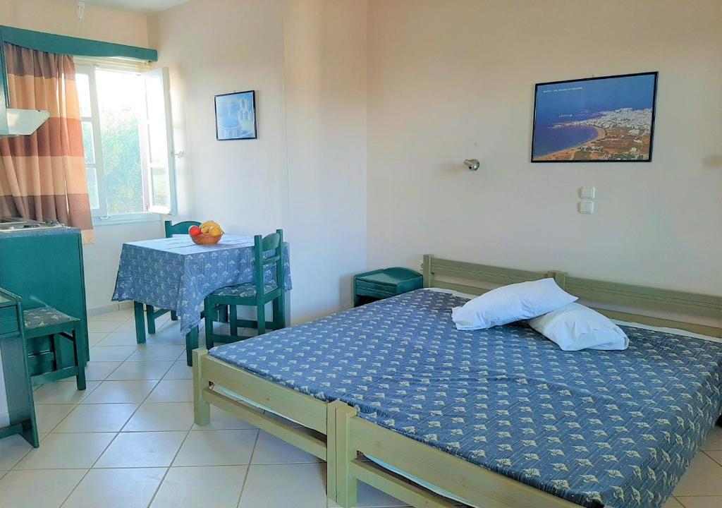 Postel nebo postele na pokoji v ubytování Joanna's Rooms on the Beach