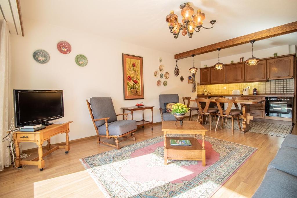Kuchyň nebo kuchyňský kout v ubytování Rehwiesa 11C by Arosa Holiday