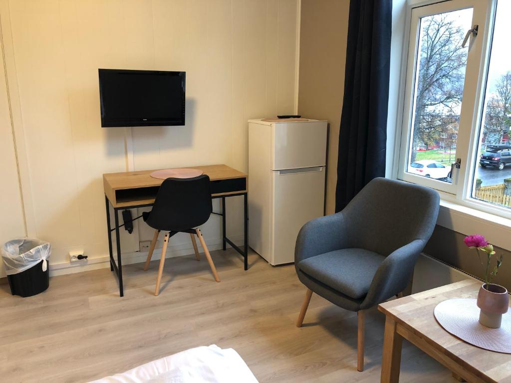 TV a/nebo společenská místnost v ubytování Ami Hotel