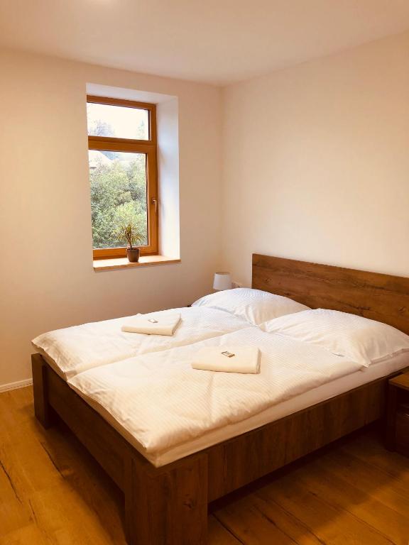 Postel nebo postele na pokoji v ubytování Penzion a Restaurace v Zátiší