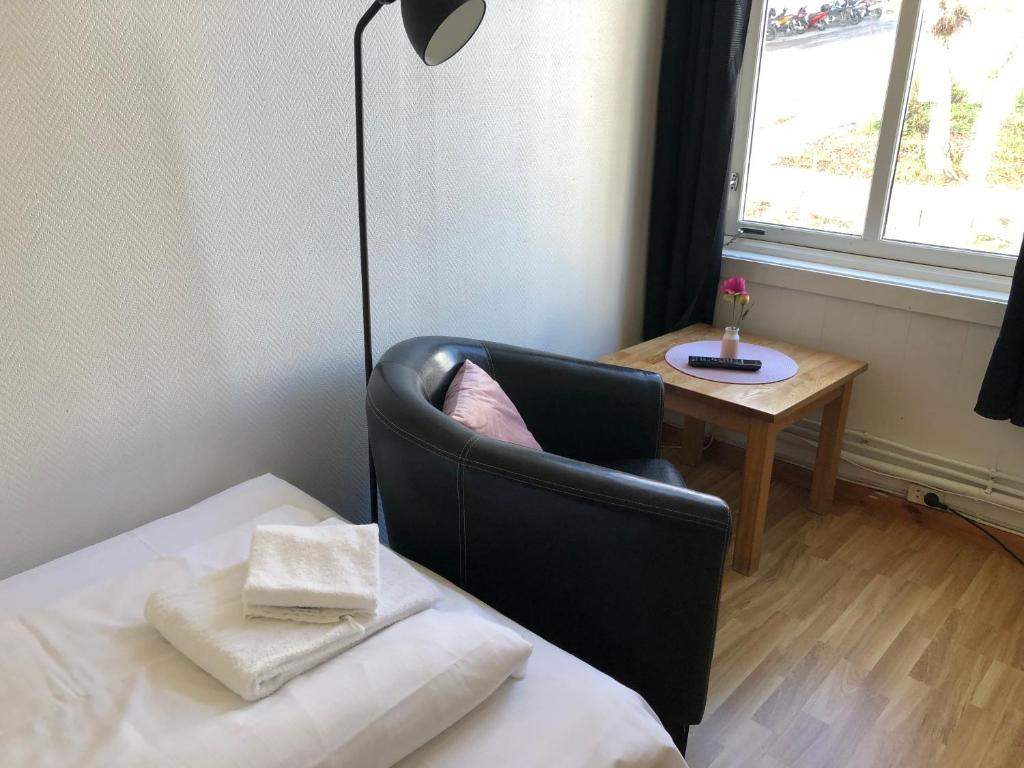 Postel nebo postele na pokoji v ubytování Ami Hotel