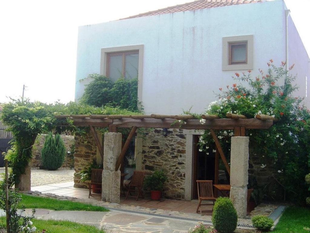 Um jardim no exterior de Casa Santa Catarina