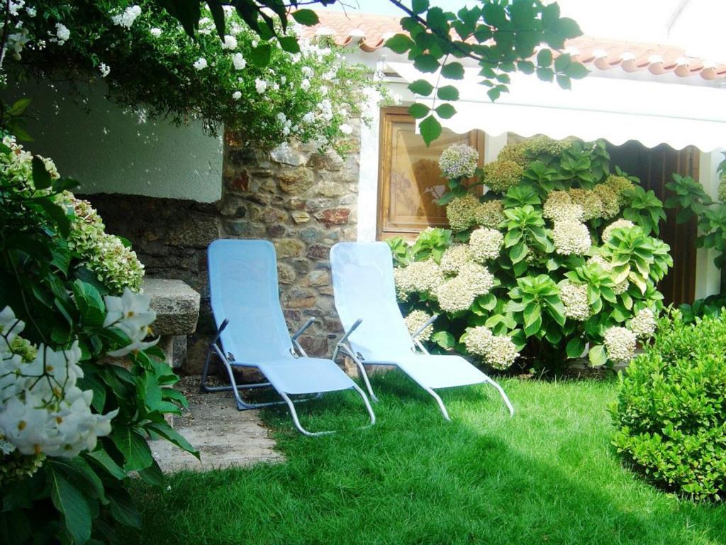 Um jardim no exterior de Casa Santa Catarina