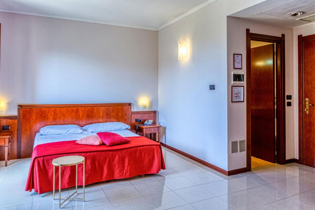 Posteľ alebo postele v izbe v ubytovaní Hotel Le Torri