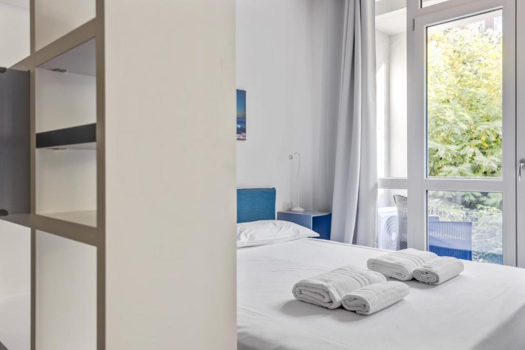 Posteľ alebo postele v izbe v ubytovaní Loft Moderno sui Navigli