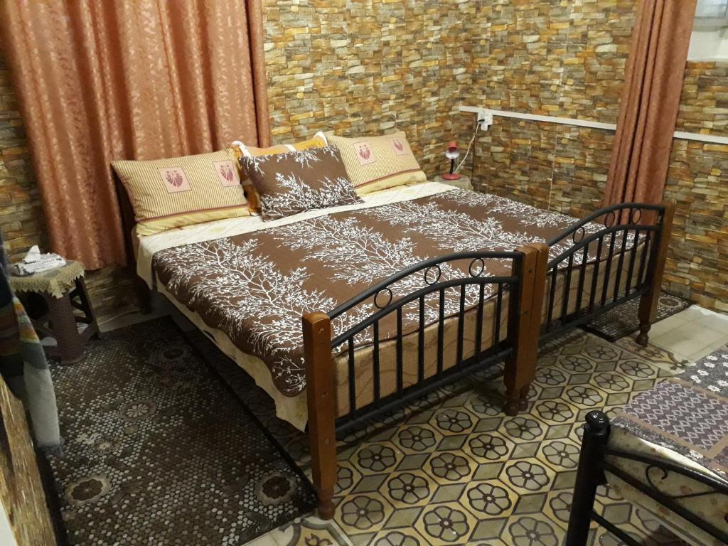 Soufan Guest HOUSE tesisinde bir odada yatak veya yataklar