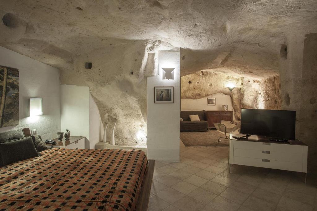 A bed or beds in a room at Residence San Pietro Barisano