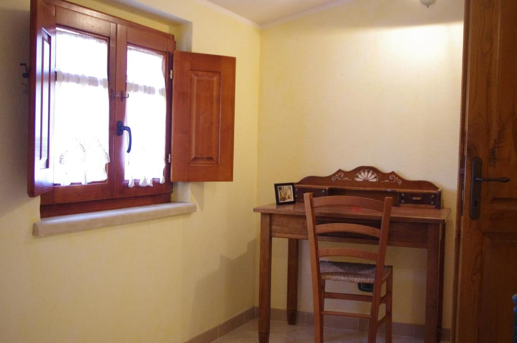 Fotografie z fotogalerie ubytování Casa De Ajala - B&B de Charme in Antica Dimora totalmente ristrutturata e dotata di tutti i confort Bagni privati Spazio living Patio esterno Ambienti climatizzati Degustazioni prodotti locali v destinaci Làconi