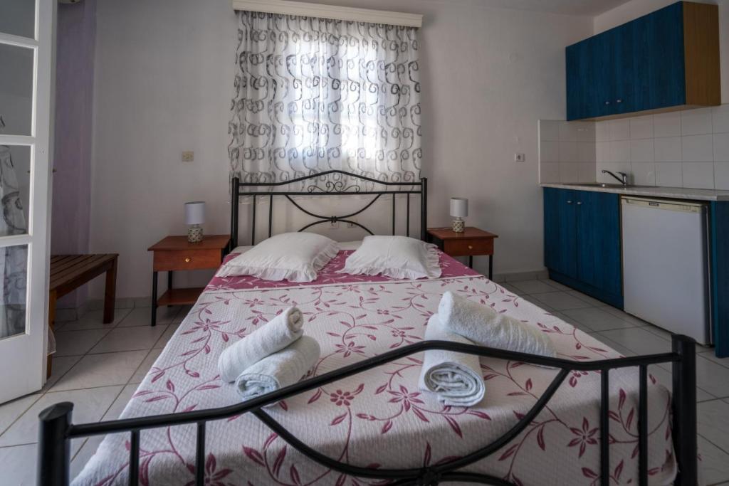 Postel nebo postele na pokoji v ubytování Villa Limnes