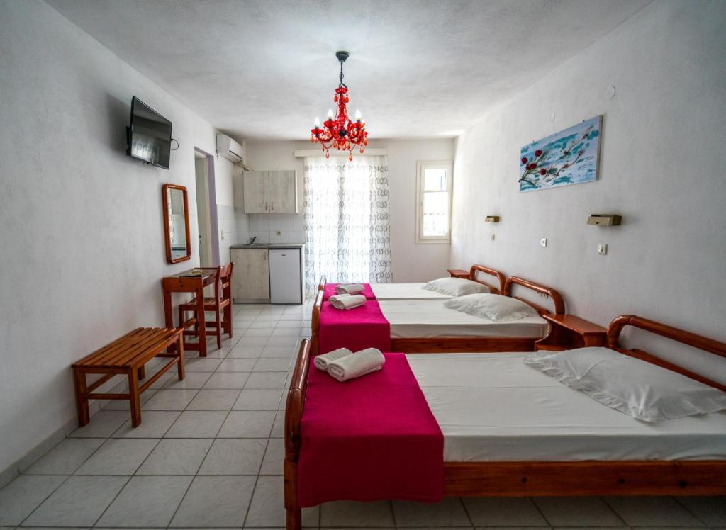 Postel nebo postele na pokoji v ubytování Villa Limnes