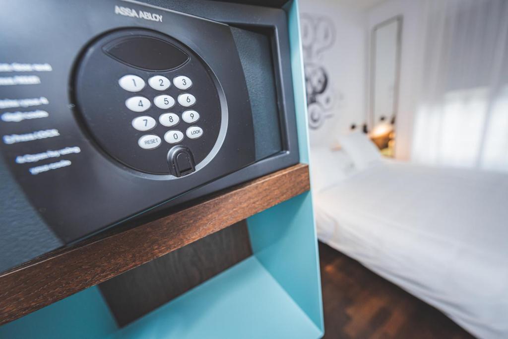 Posteľ alebo postele v izbe v ubytovaní Hotel Bernina Geneva