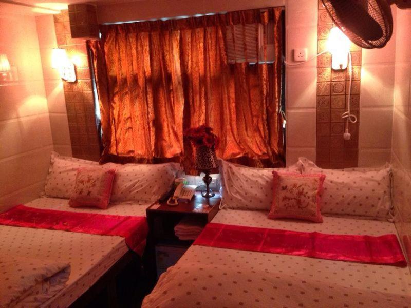 Postel nebo postele na pokoji v ubytování Marrigold Hostel