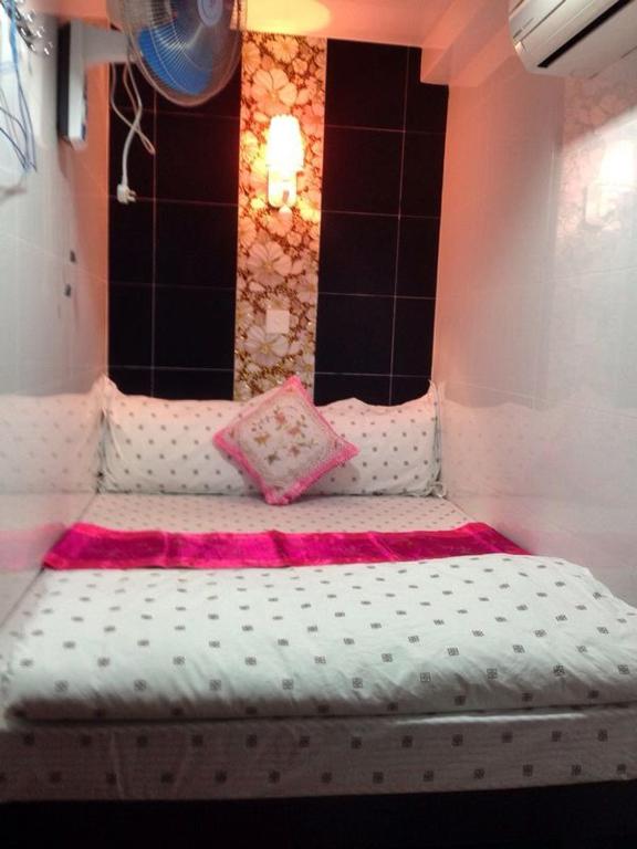Postel nebo postele na pokoji v ubytování Marrigold Hostel
