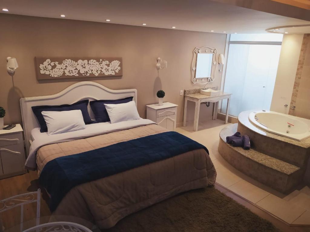 Postel nebo postele na pokoji v ubytování Hotel Domo