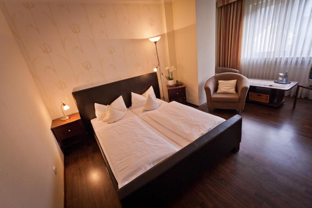 Voodi või voodid majutusasutuse Hotel Spies toas
