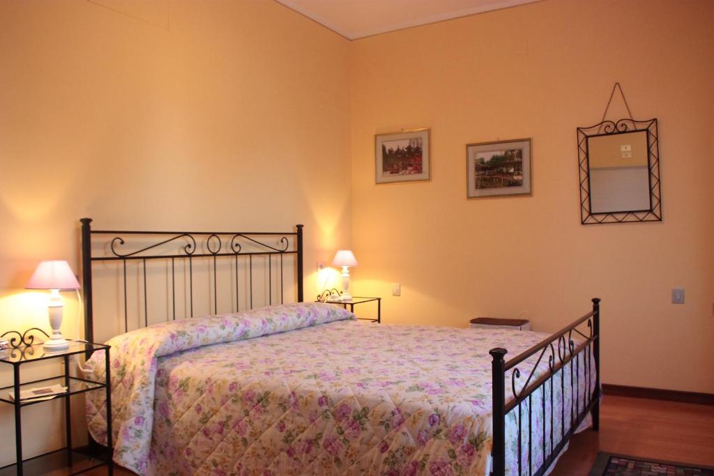 Postel nebo postele na pokoji v ubytování B&B I Narcisi