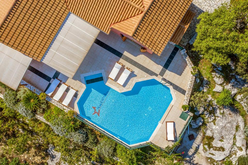 an overhead view of a swimming pool in a house at Asteria Villas in Meganisi