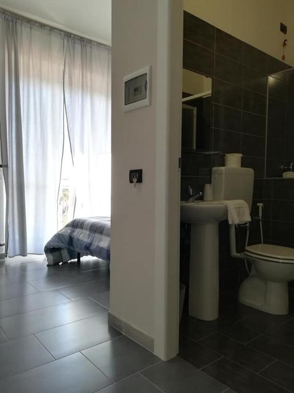Koupelna v ubytování LE MURA Foresteria