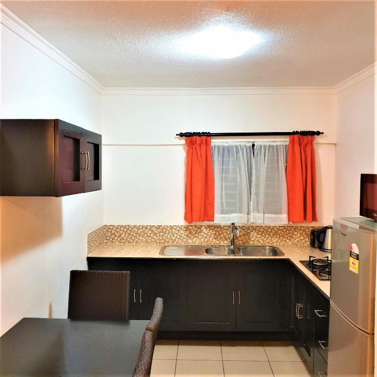 Kuchyň nebo kuchyňský kout v ubytování Suva Motor Inn